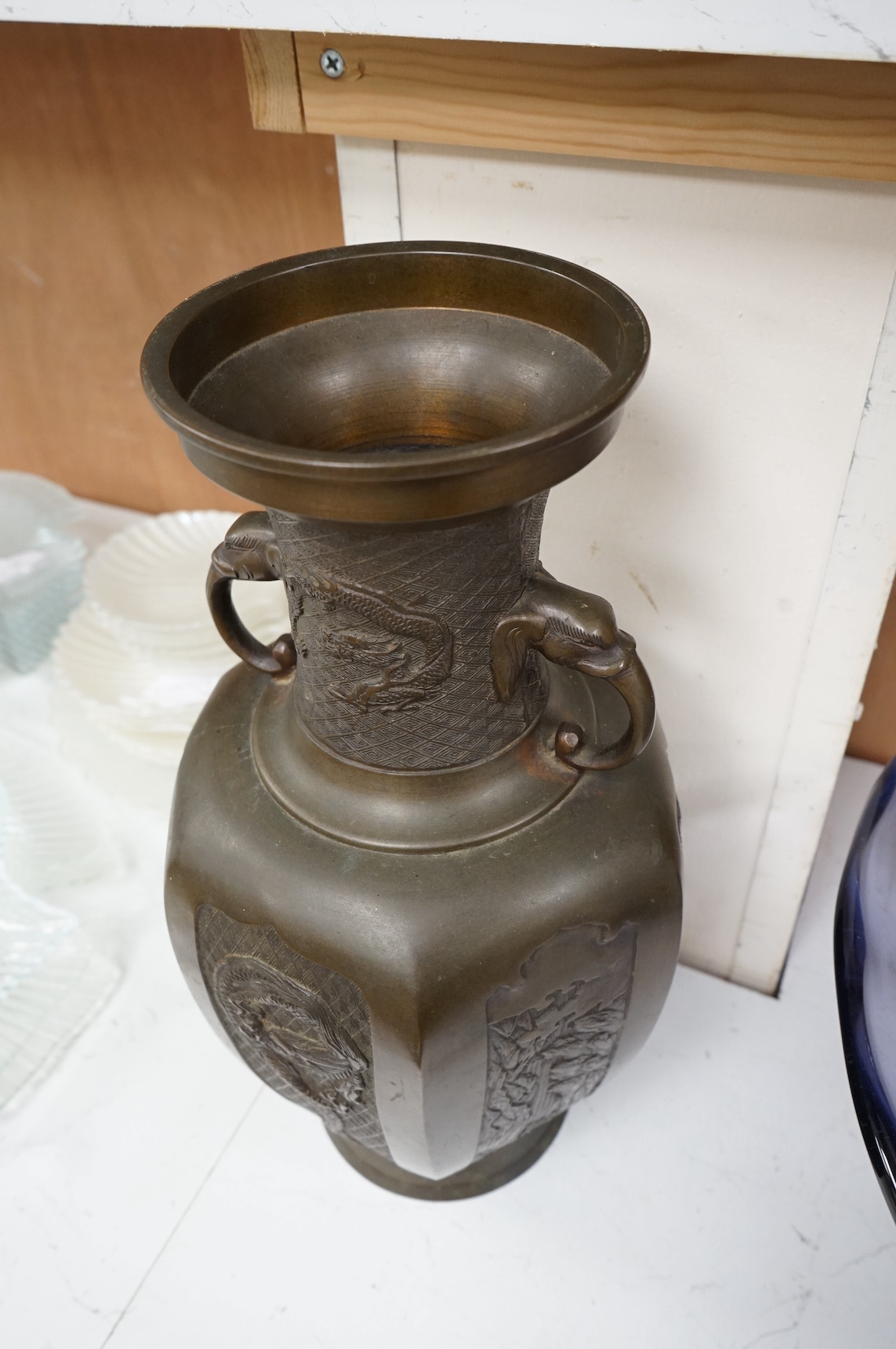 An early 20th century Japanese bronze vase with twin ‘elephant’ handles, 39cm. Condition - good